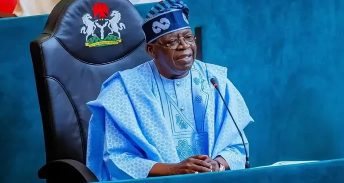 tinubu blames high borrowing costs for weak manufacturing sector