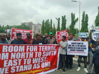 youths protest at national assembly over rising insecurity in nigeria