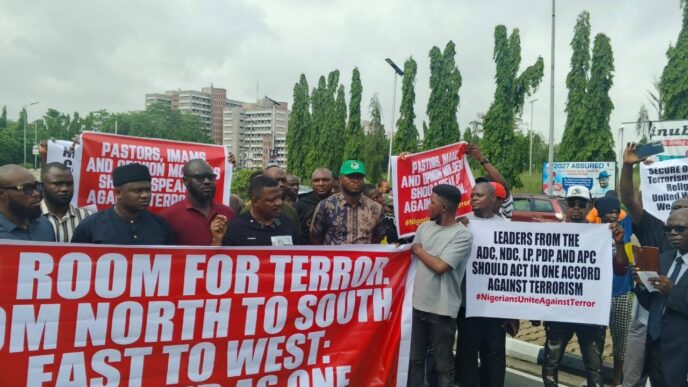 youths protest at national assembly over rising insecurity in nigeria