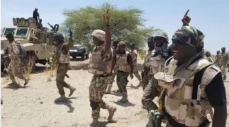 iswap family members surrender to army troops in borno