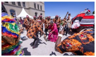 okonjo iweala dances with igbo masquerades at wto open day in switzerland video